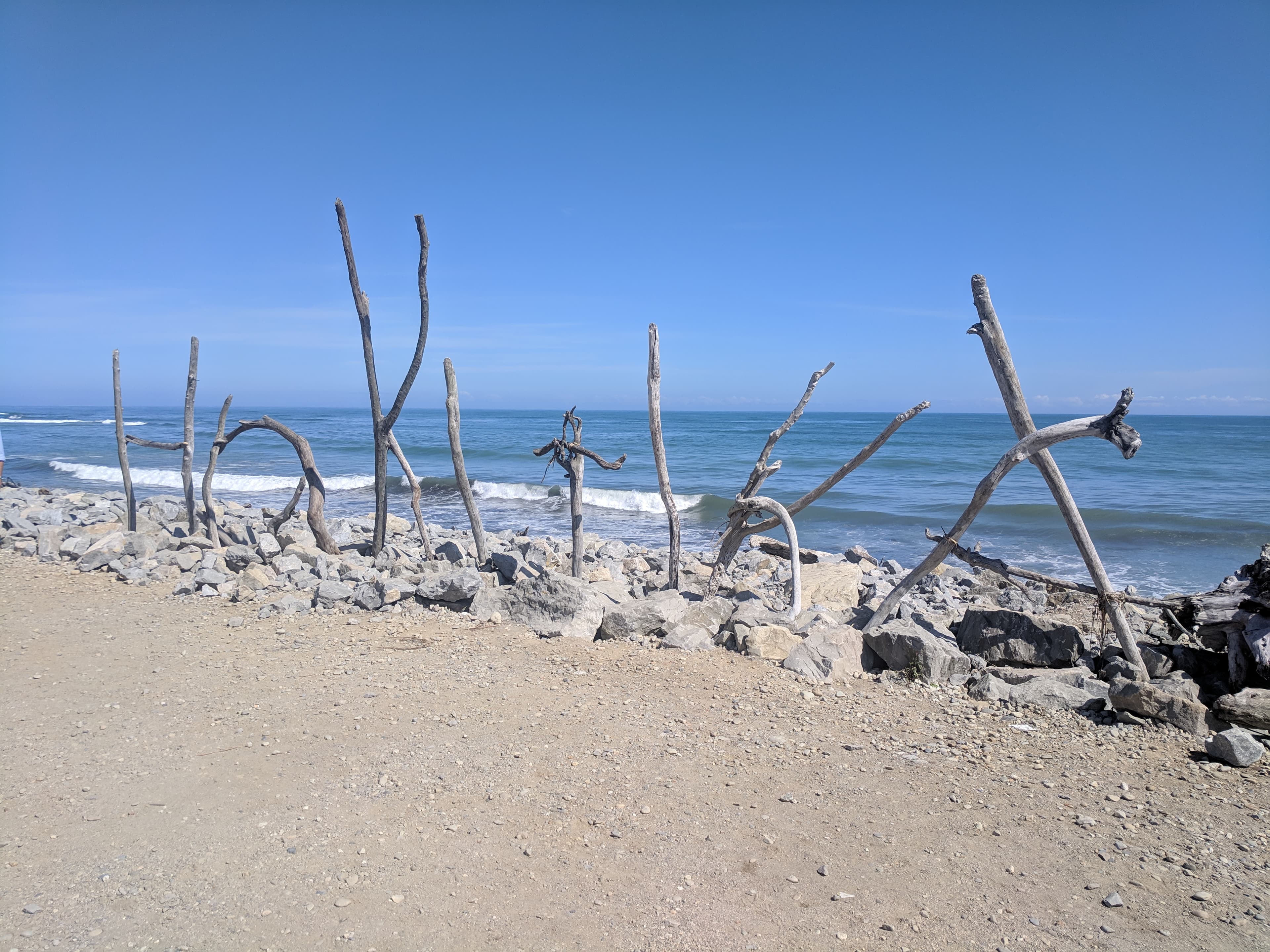 Sticks displaying Hokitika at Hokitika Beach