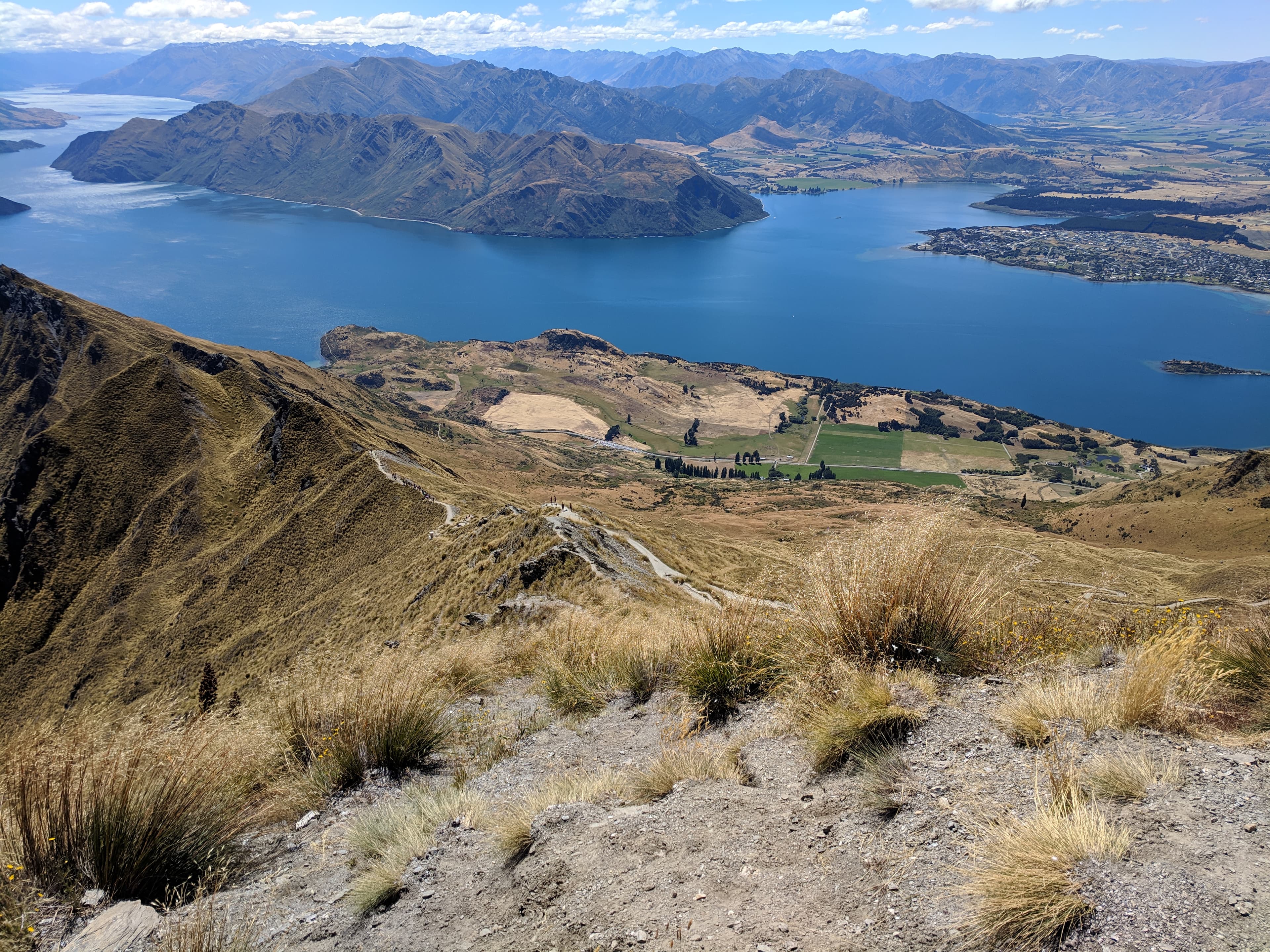 Looking down at the line for the photo spot at Roys Peak