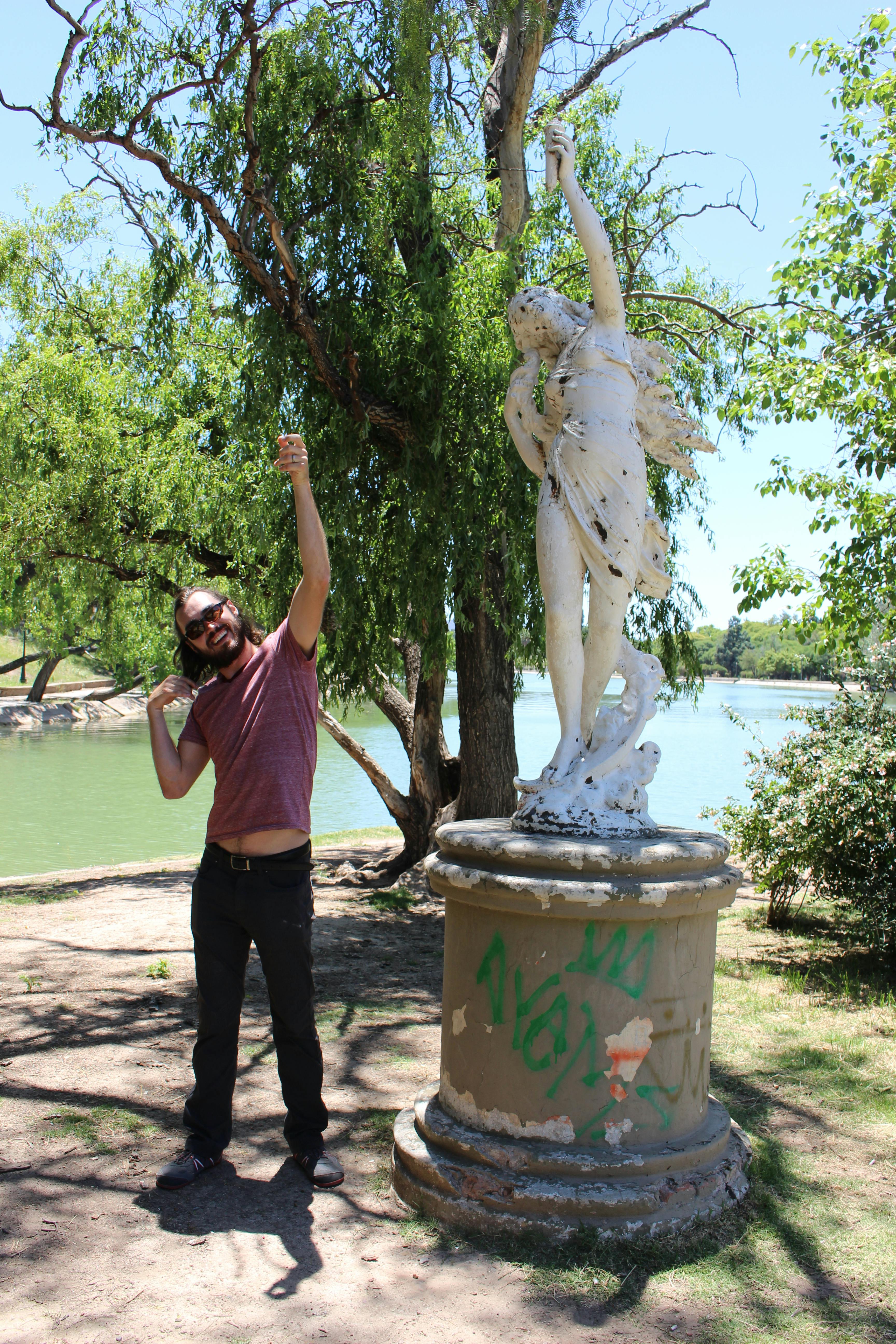 Gerrod mimicking a statue at Parque San Martín